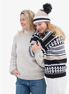 Kleuren muts met bontpompon