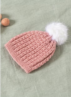 Muts met bontpompon