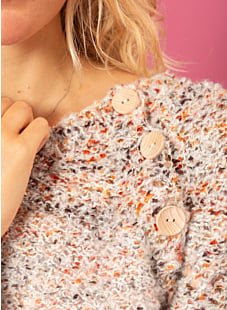 Bouclé raglantrui met knopen